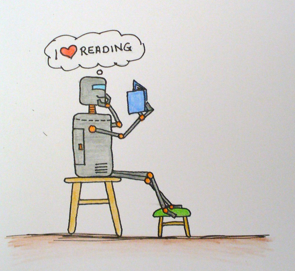 Drawing of a robot saying "I love reading"